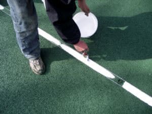 during our tennis court repair we use traditional methods